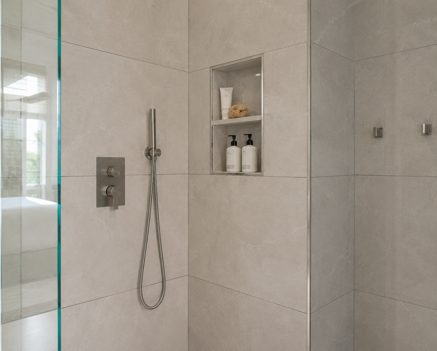 Walk-in shower with full-height wall tile